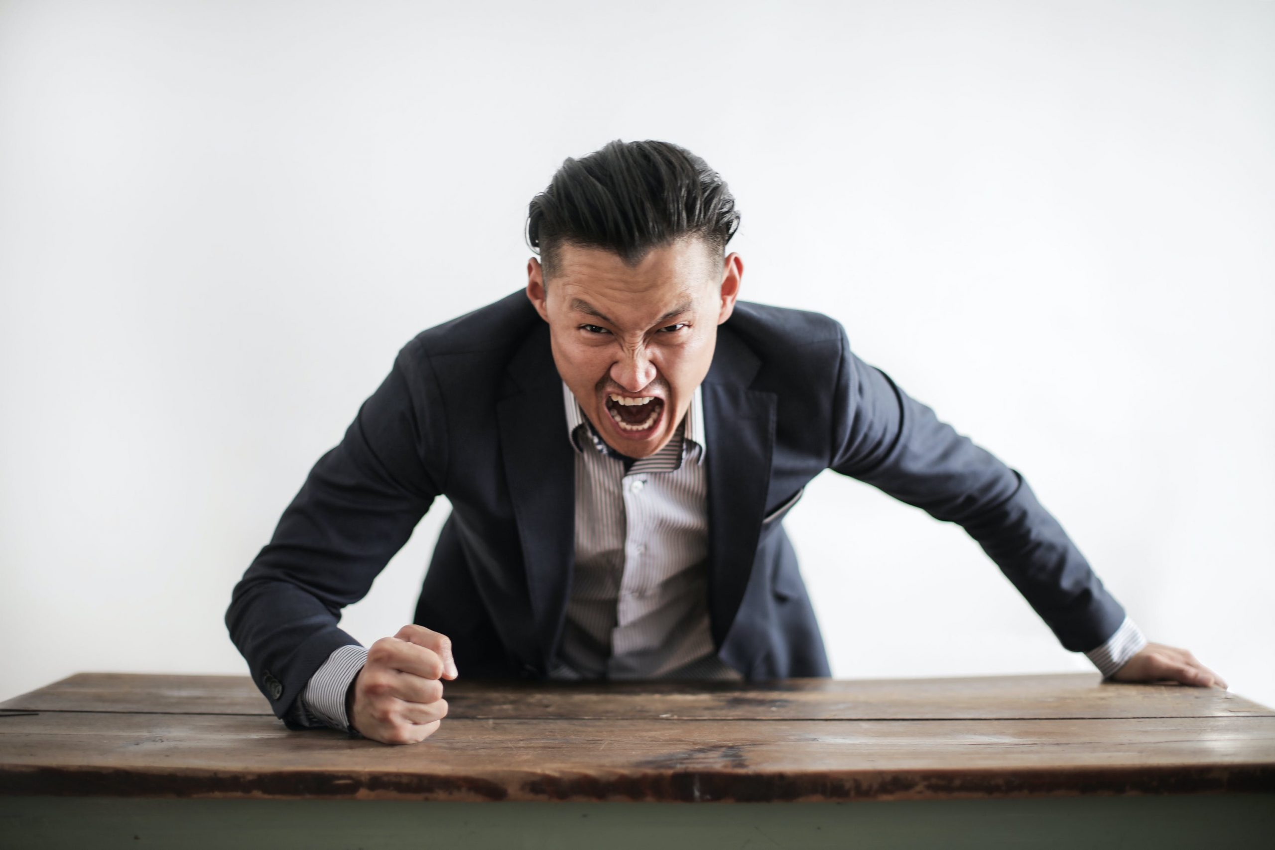 man screaming at camera